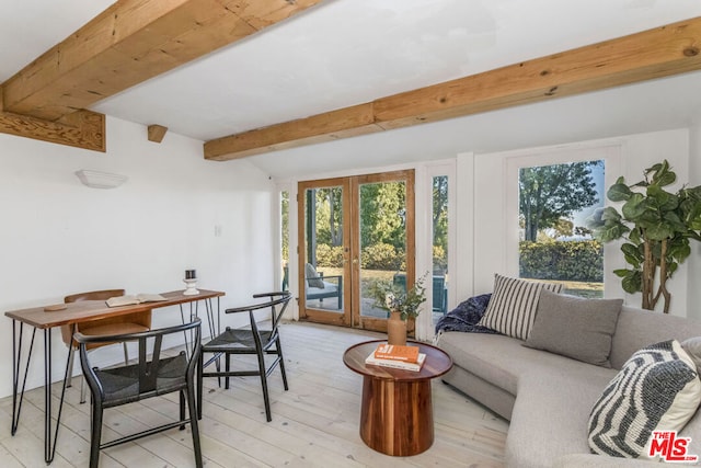 interior space with beamed ceiling and french doors