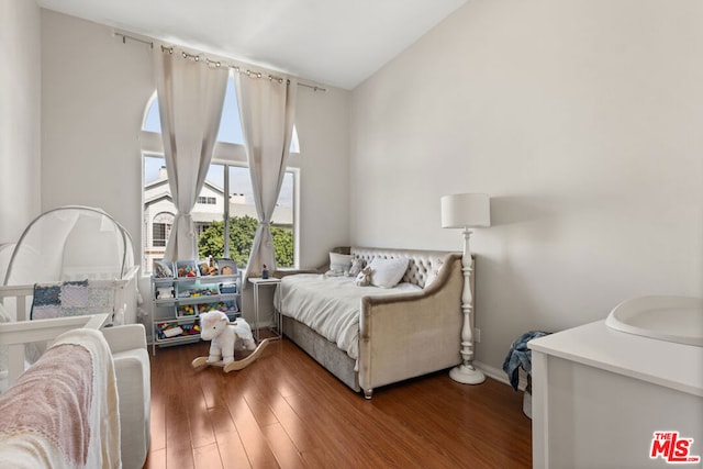 bedroom featuring hardwood / wood-style flooring