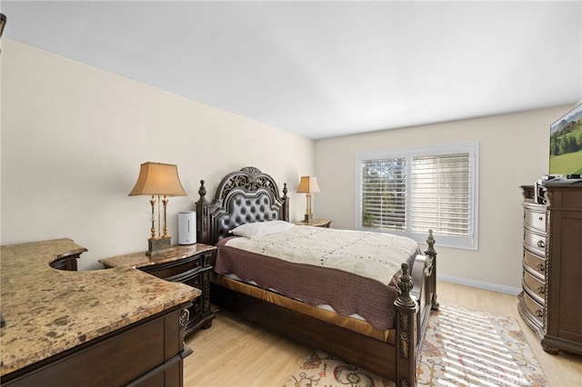 bedroom featuring light wood-type flooring