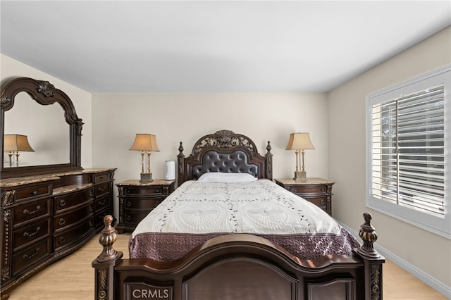 bedroom featuring light wood-type flooring