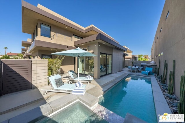 view of pool with a patio area