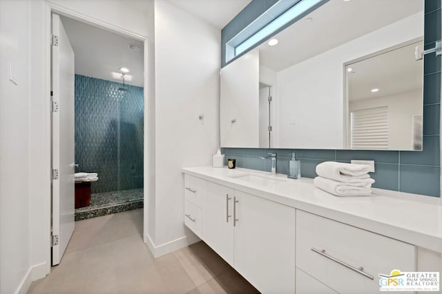 bathroom featuring vanity, tasteful backsplash, walk in shower, and concrete floors