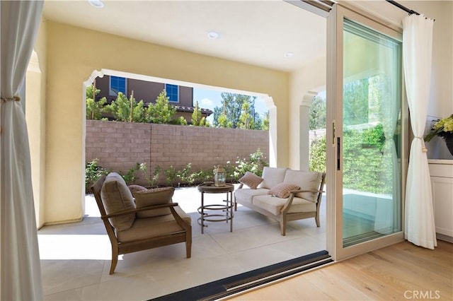 66 Poncho, Irvine, CA 92602 - doorway featuring wood finished floors and recessed lighting