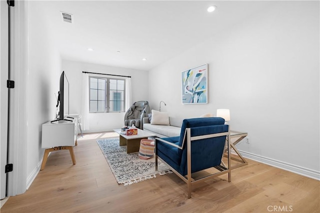 66 Poncho, Irvine, CA 92602 - living area with light wood-style flooring, baseboards, and recessed lighting