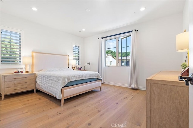 bedroom with light wood-type flooring