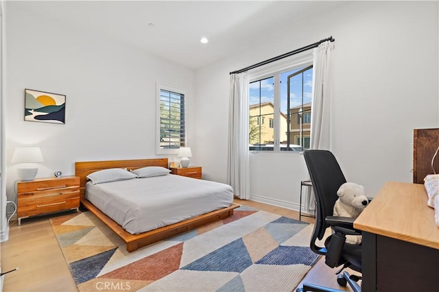 bedroom featuring light hardwood / wood-style floors