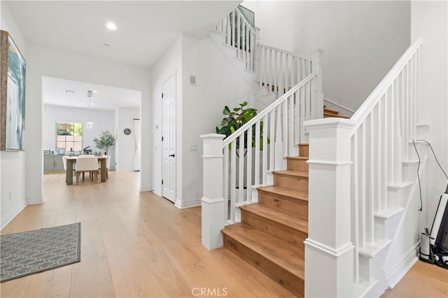 66 Poncho, Irvine, CA 92602 - staircase with wood finished floors, recessed lighting, and baseboards