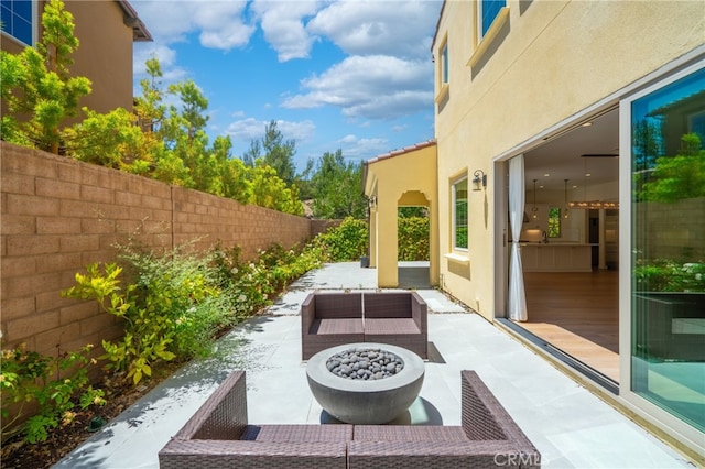 66 Poncho, Irvine, CA 92602 - fenced backyard featuring a patio area and a fire pit