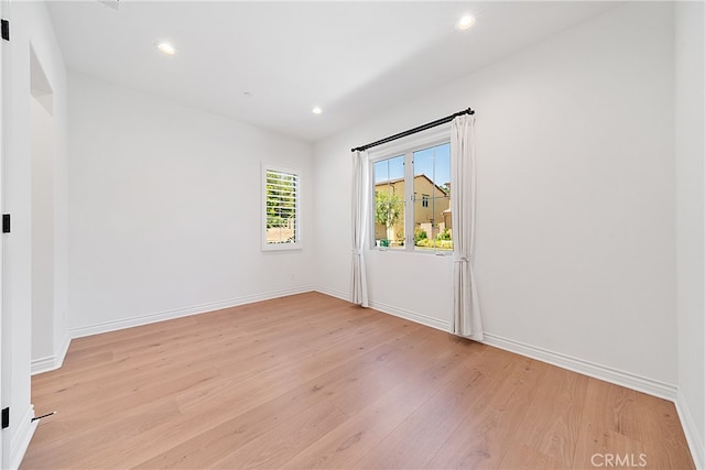 66 Poncho, Irvine, CA 92602 - spare room with light wood-style floors and recessed lighting