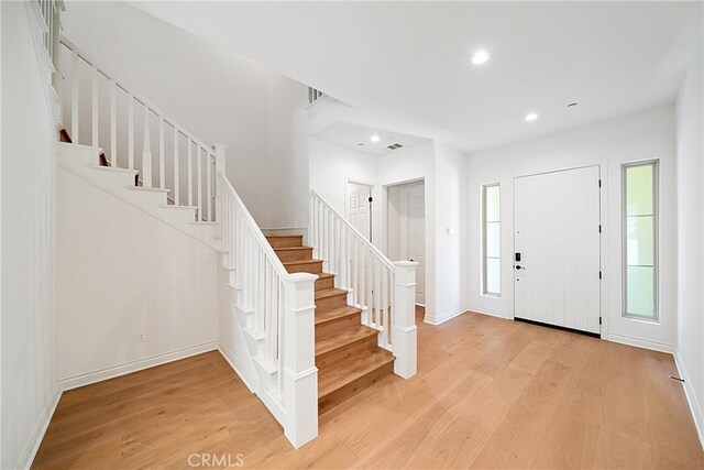 66 Poncho, Irvine, CA 92602 - foyer entrance featuring stairs, light wood-type flooring, and recessed lighting
