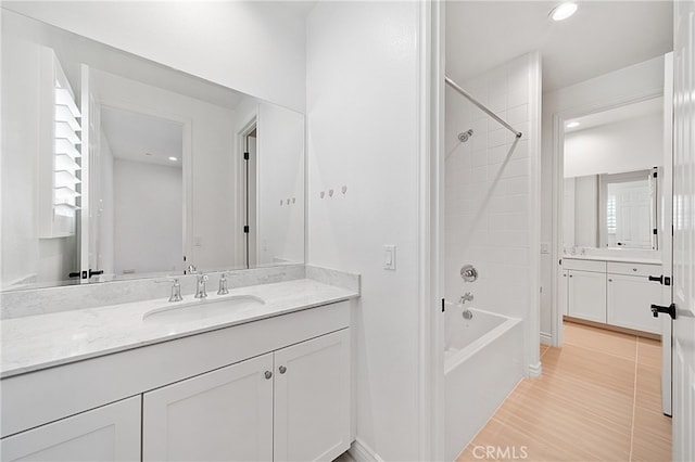 66 Poncho, Irvine, CA 92602 - full bath with vanity, bathtub / shower combination, recessed lighting, and wood finished floors