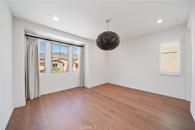 66 Poncho, Irvine, CA 92602 - unfurnished room featuring light wood-style floors and recessed lighting