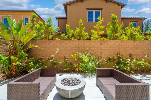 66 Poncho, Irvine, CA 92602 - view of patio with an outdoor living space with a fire pit