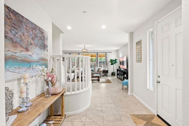 entrance foyer with light tile patterned flooring