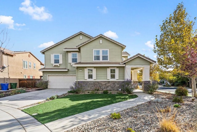 craftsman-style house with a garage and a front yard