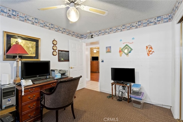 office space with light colored carpet and a textured ceiling