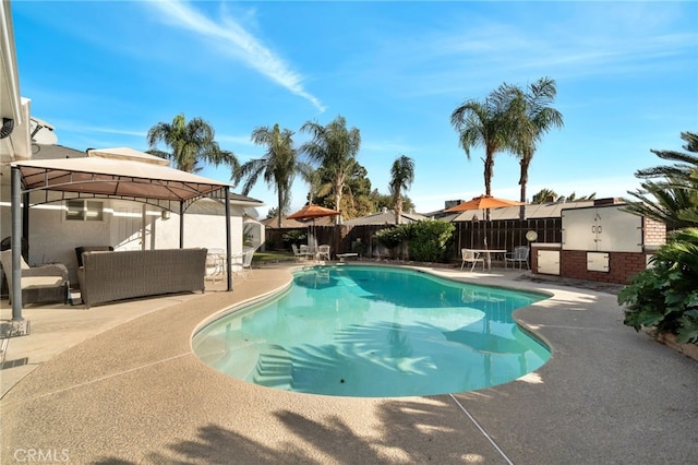 view of pool featuring a gazebo and a patio area