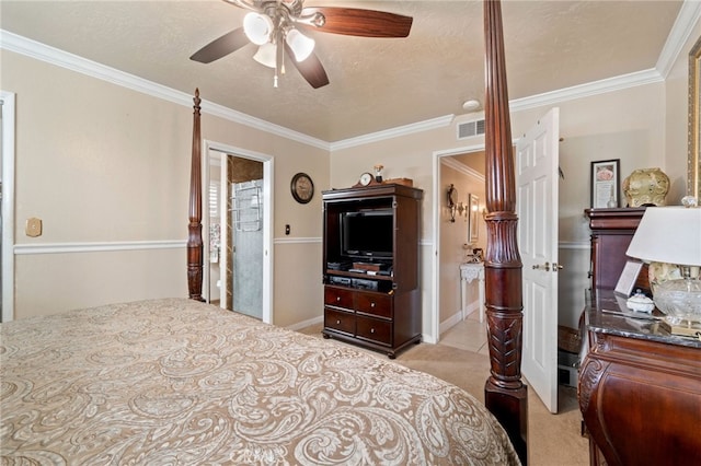 carpeted bedroom featuring ceiling fan, a textured ceiling, and ornamental molding