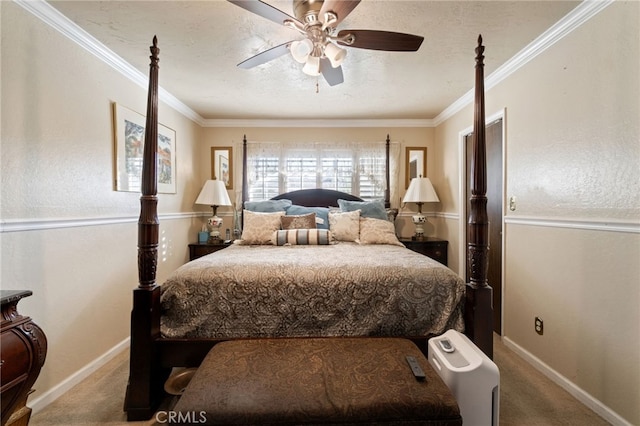 bedroom with carpet, ceiling fan, and crown molding