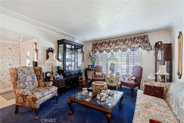 carpeted living room with a textured ceiling, decorative columns, and crown molding