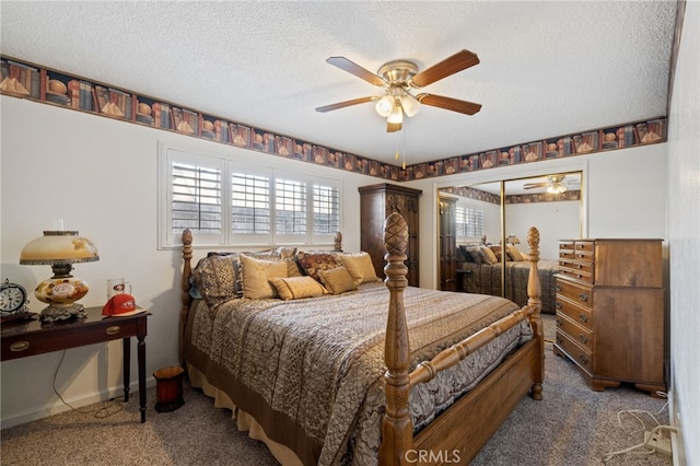 bedroom with carpet flooring, a textured ceiling, and ceiling fan