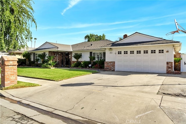 single story home with a garage and a front yard