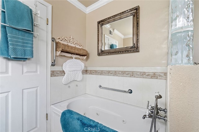 bathroom with ornamental molding and a tub