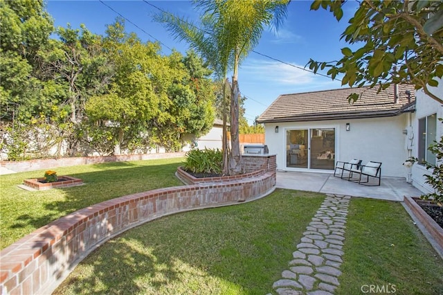 view of yard with a patio area