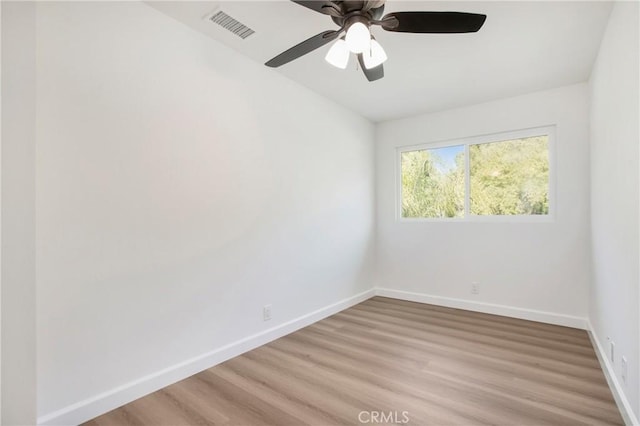 unfurnished room featuring ceiling fan and light hardwood / wood-style floors