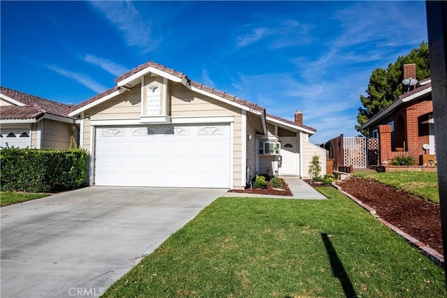 ranch-style home featuring a garage and a front yard