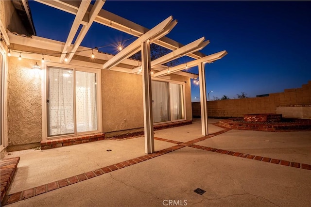 view of patio at twilight