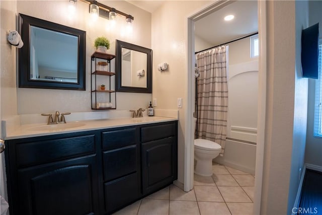 full bathroom with toilet, shower / bath combination with curtain, vanity, and tile patterned floors