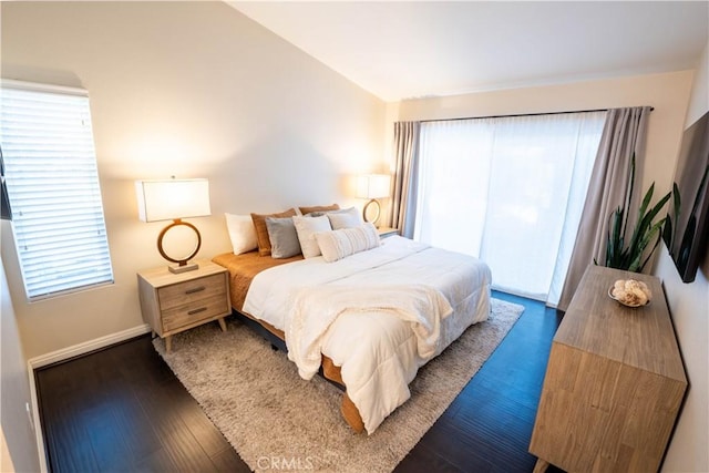 bedroom featuring dark hardwood / wood-style floors