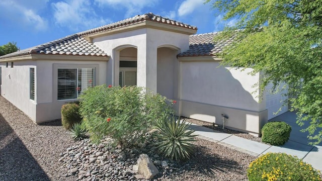 view of property exterior with a garage