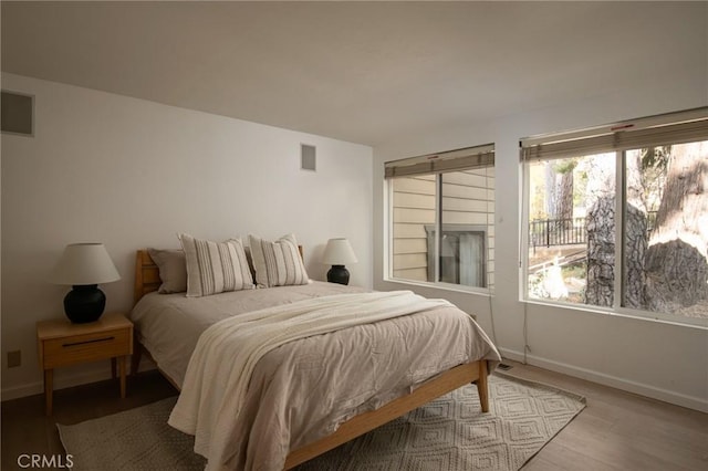 bedroom featuring hardwood / wood-style floors