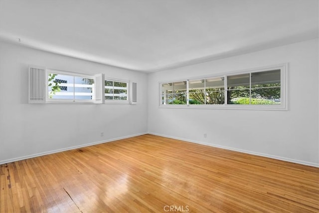 empty room with light wood-type flooring