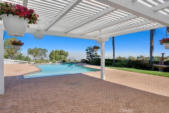 view of pool with a pergola