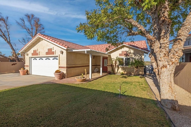 view of front of home with a garage and a front lawn