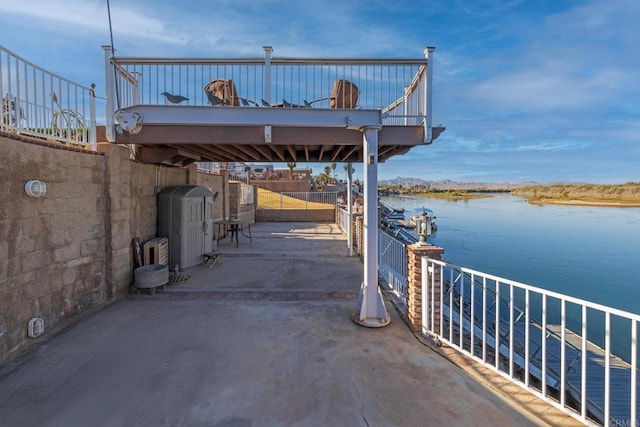 view of patio / terrace with a water view