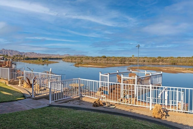 dock area with a water view