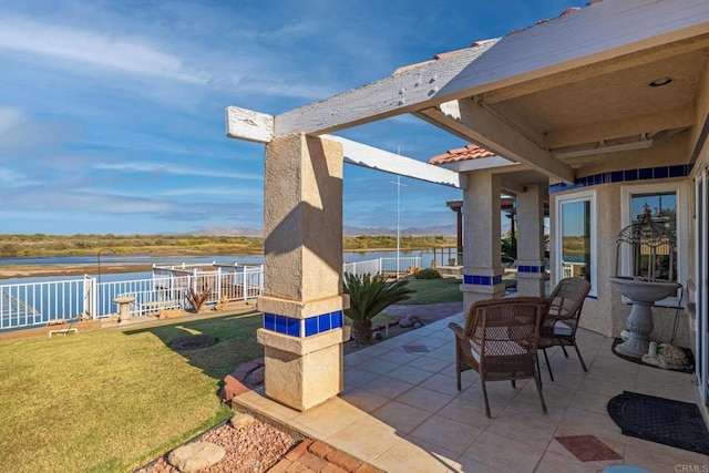 view of patio / terrace featuring a water view