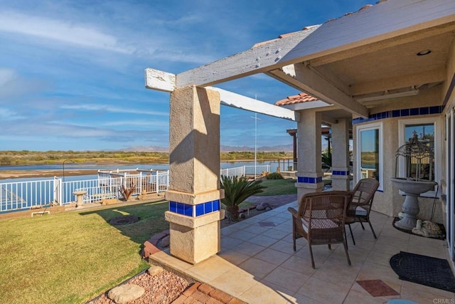 5770 Colorado River Rd, Blythe, CA 92225 - view of patio / terrace featuring a water view