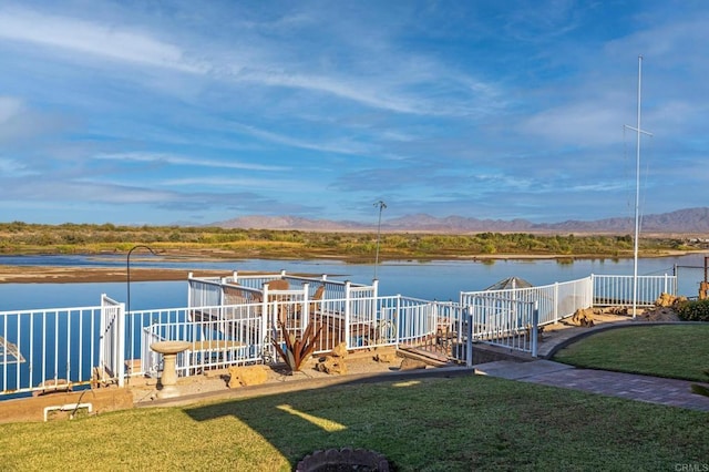 exterior space with a water view