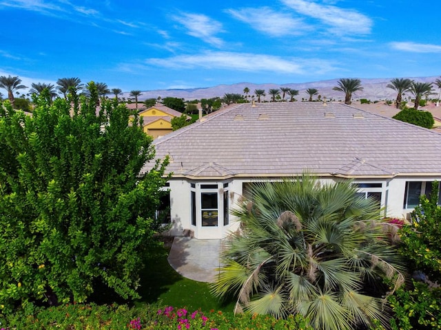 exterior space featuring a mountain view