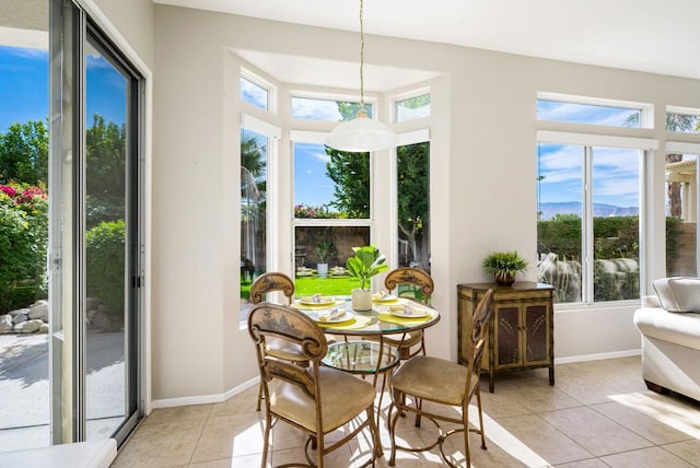 sunroom / solarium with a wealth of natural light