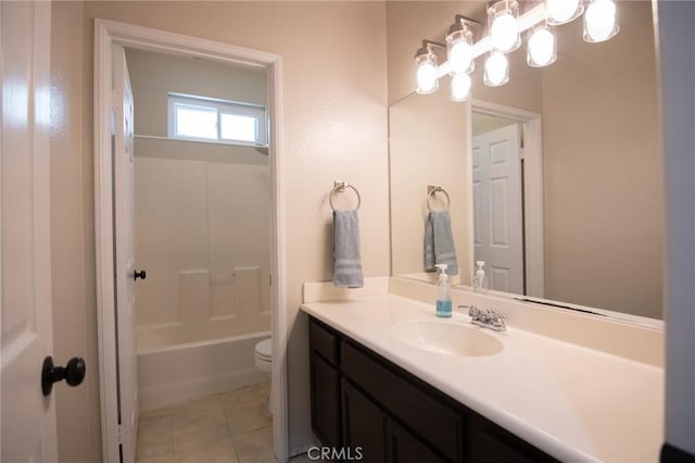 full bathroom with tile patterned floors, shower / bathing tub combination, vanity, and toilet