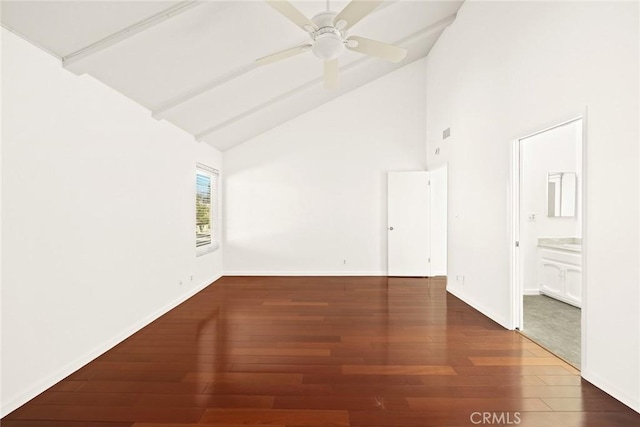 empty room with beam ceiling, ceiling fan, high vaulted ceiling, and dark hardwood / wood-style floors