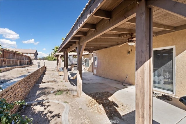 view of patio with ceiling fan