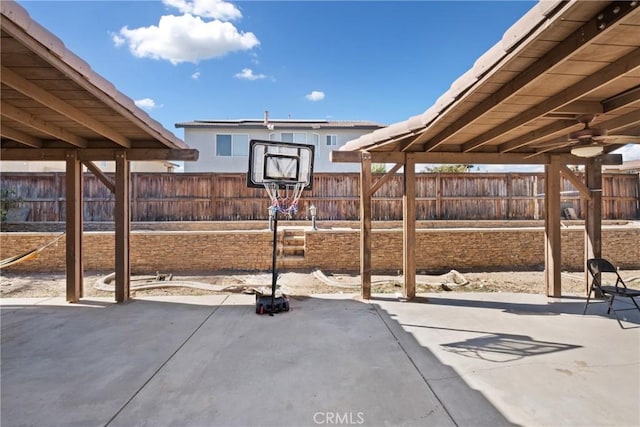 view of patio featuring ceiling fan