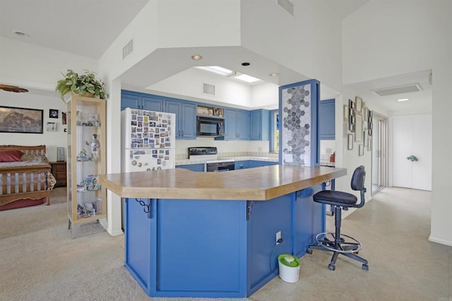 kitchen featuring a kitchen bar, white refrigerator, electric range oven, and blue cabinets